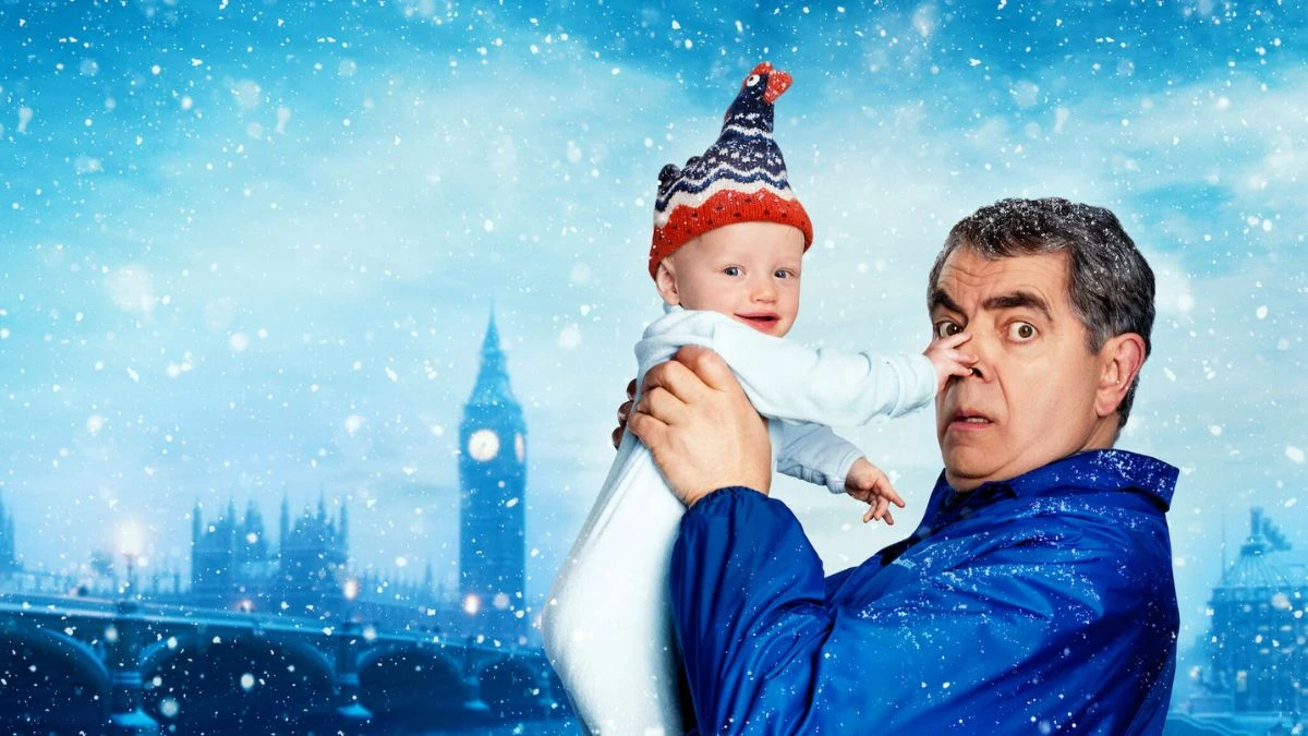 Czy dziecko z Człowiek kontra dziecko jest prawdziwe Rowan Atkinson na planie 'Man vs Baby' w scenie z niemowlakiem